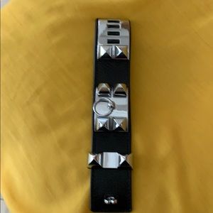 Leather bracelet with silver tone studs